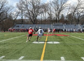 Natick 11, Wellesley 8 – Redhawks hang on for rivalry win despite crazy 4th quarter